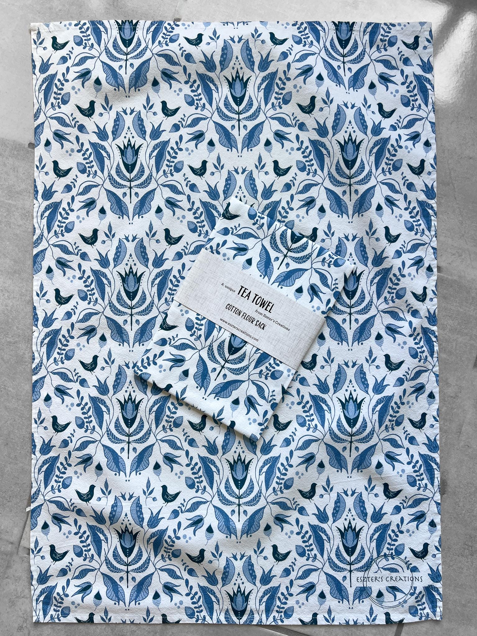 Blue folklore tea towel
