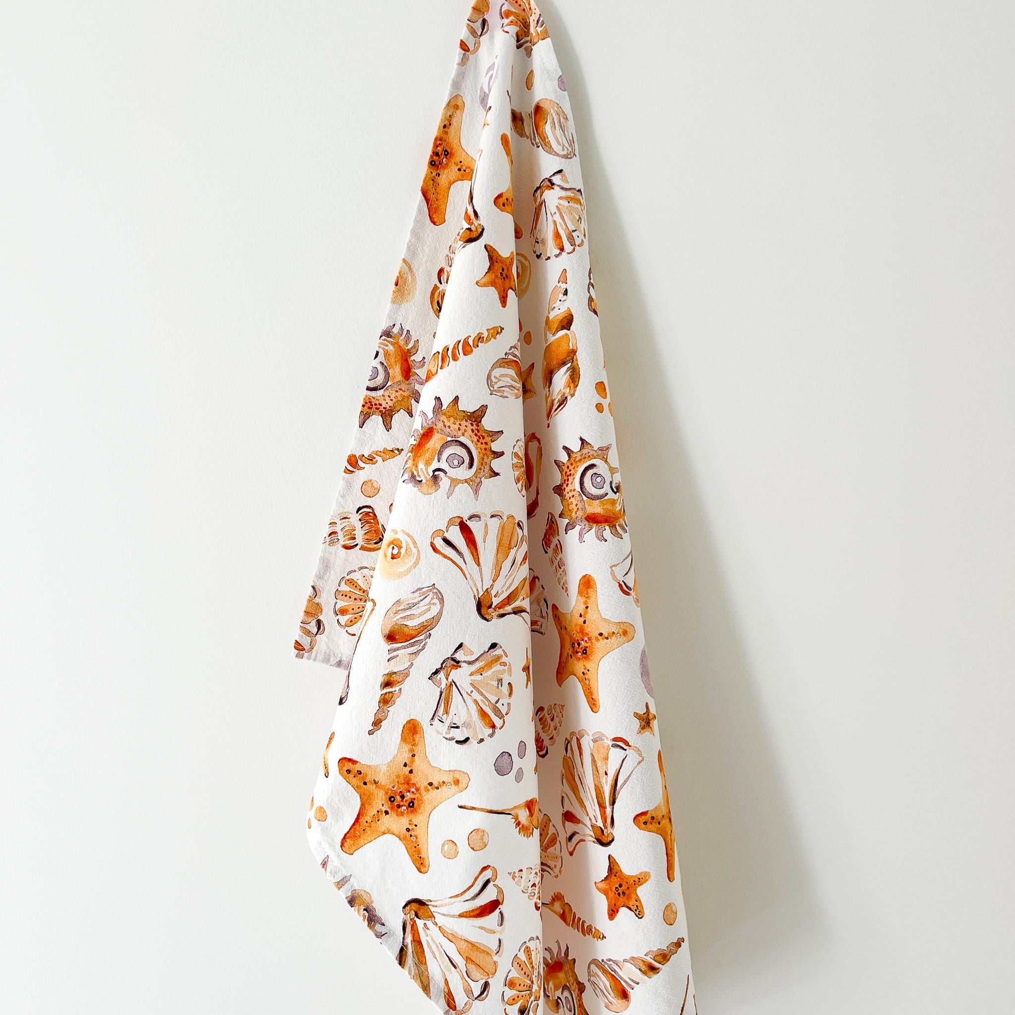 Sea shells tea towel