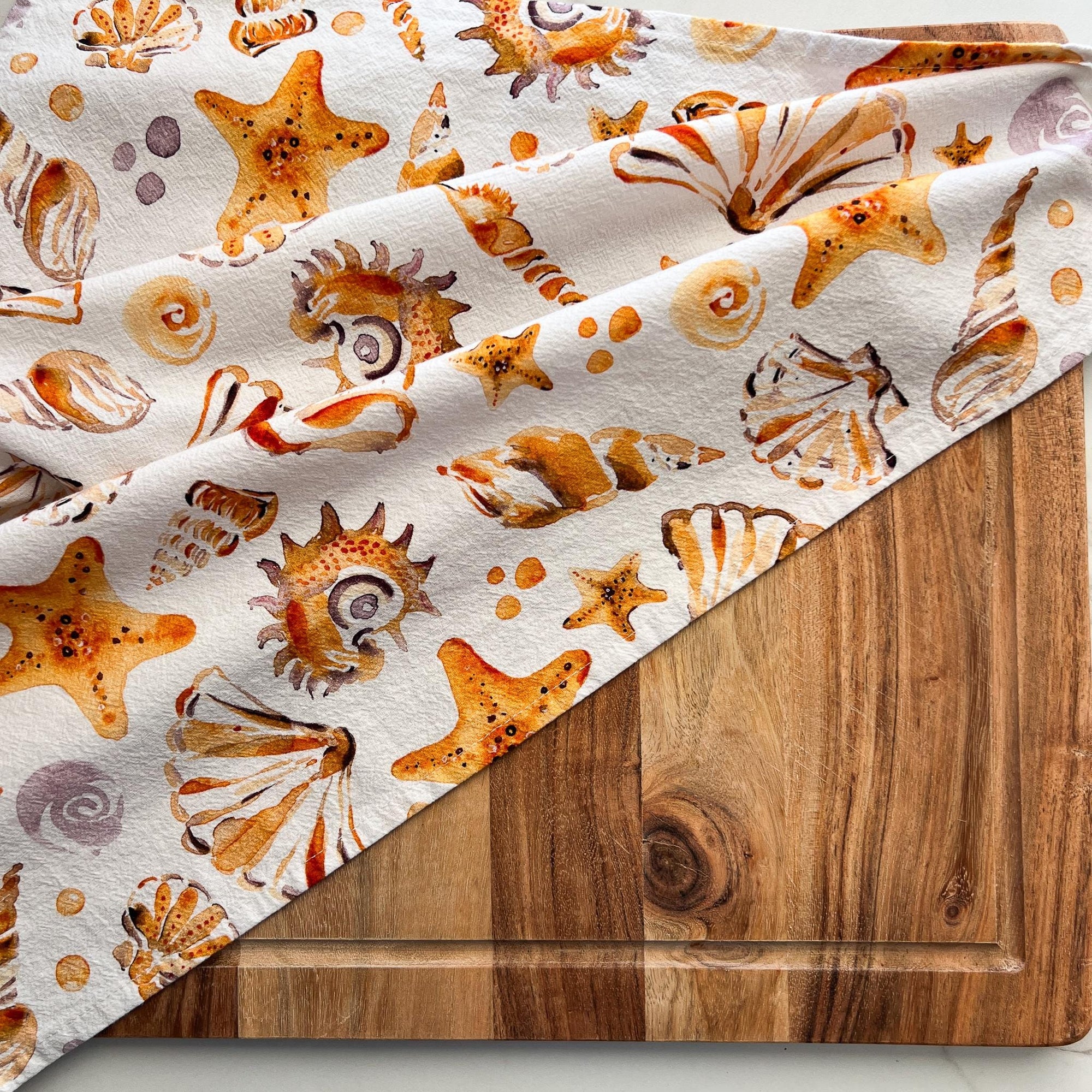 Sea shells tea towel