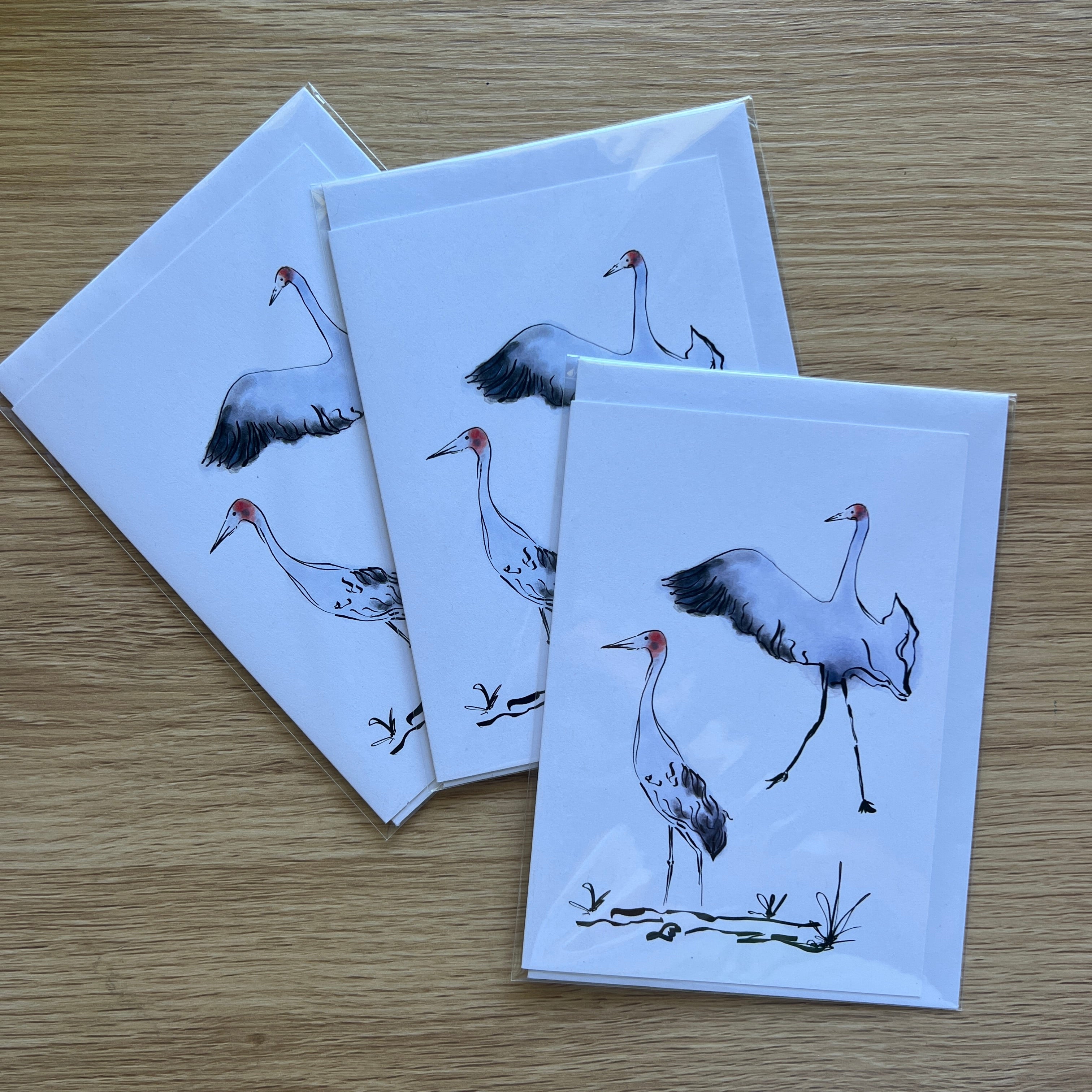 Dancing brolgas Greeting card