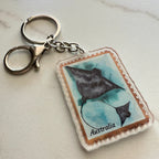 Keychain with a design of two stingrays on an Australia postage stamp