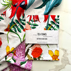 colorful vibrant australian wildflowers on cotton fabric tea towel