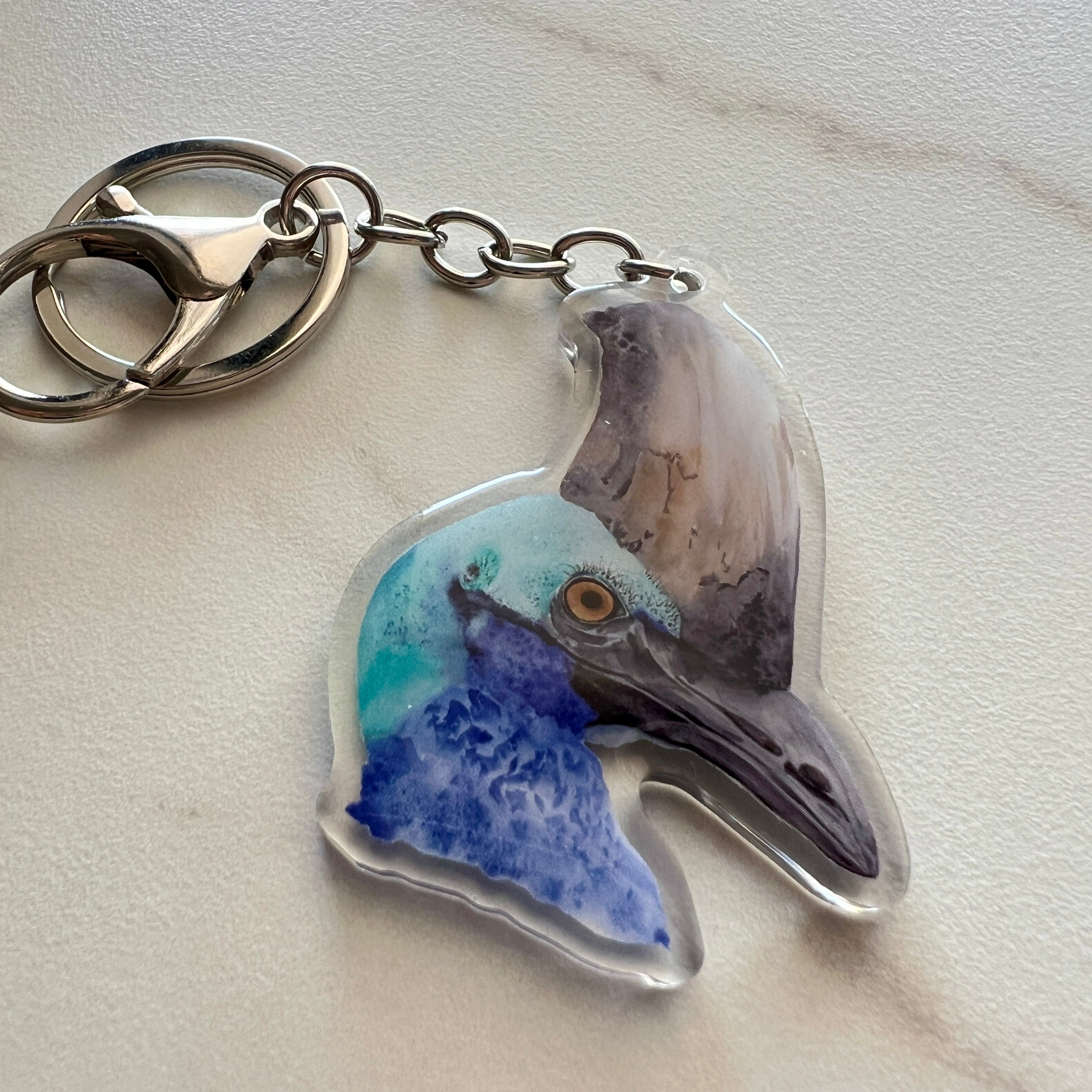 Keychain with a southern cassowary design on a light background