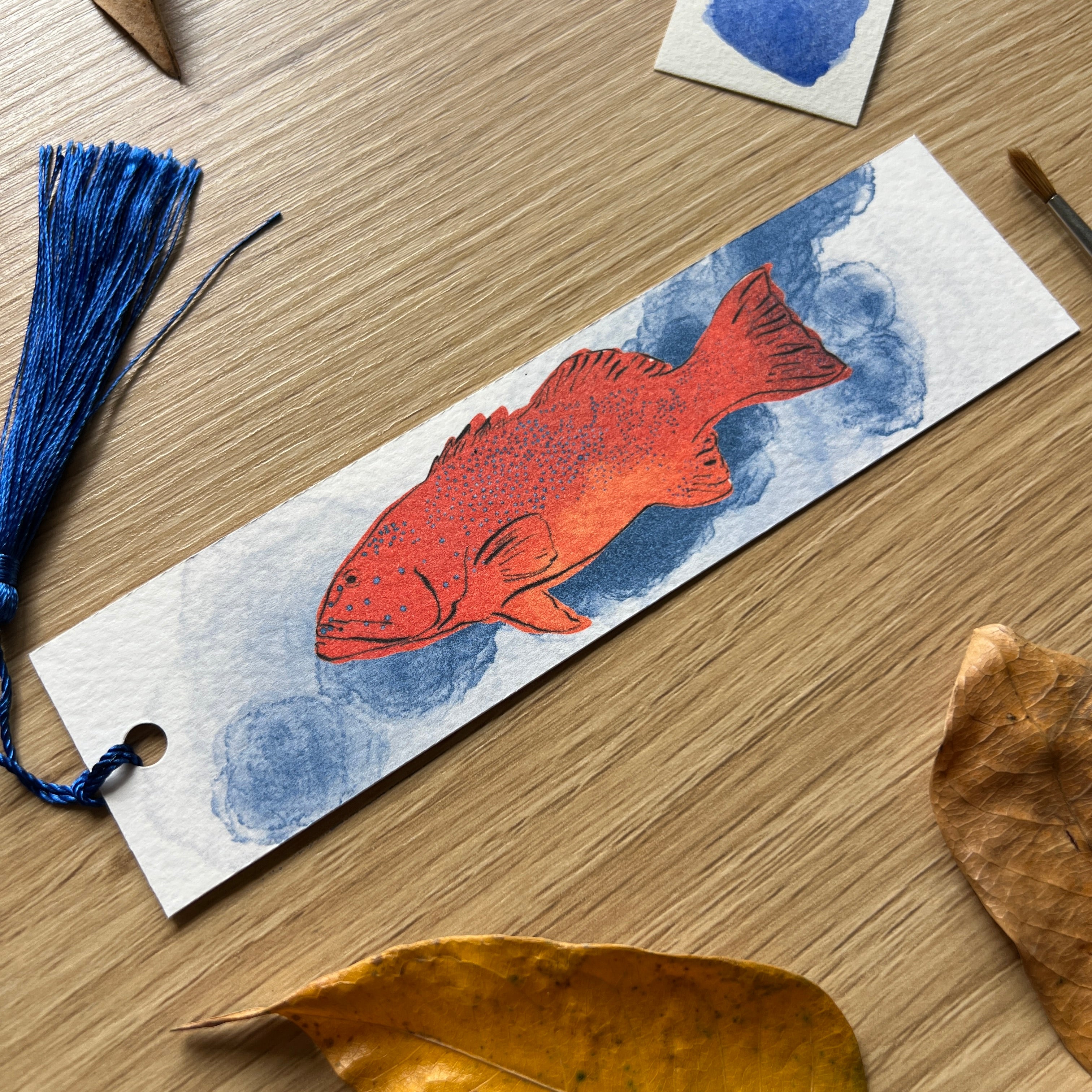 coral trout bookmark with paintbursh and leaves