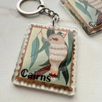 kookaburra travel keychain with cairns written on it
