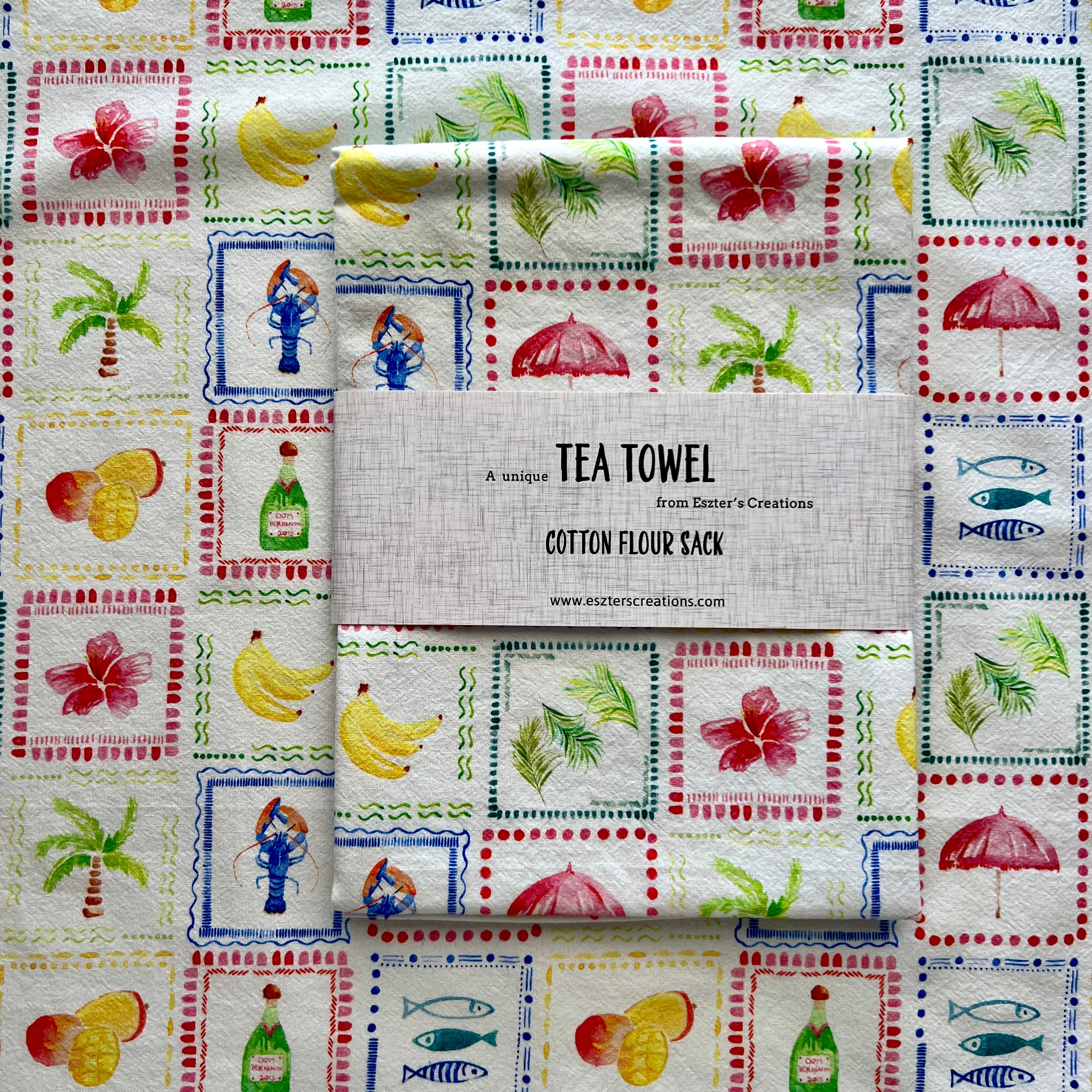Beautiful soft cotton teatowel that reminds you of a tropical holiday, featuring bananas, mangoes, palm leaves, hibiscus, sunbrella, palm tree.