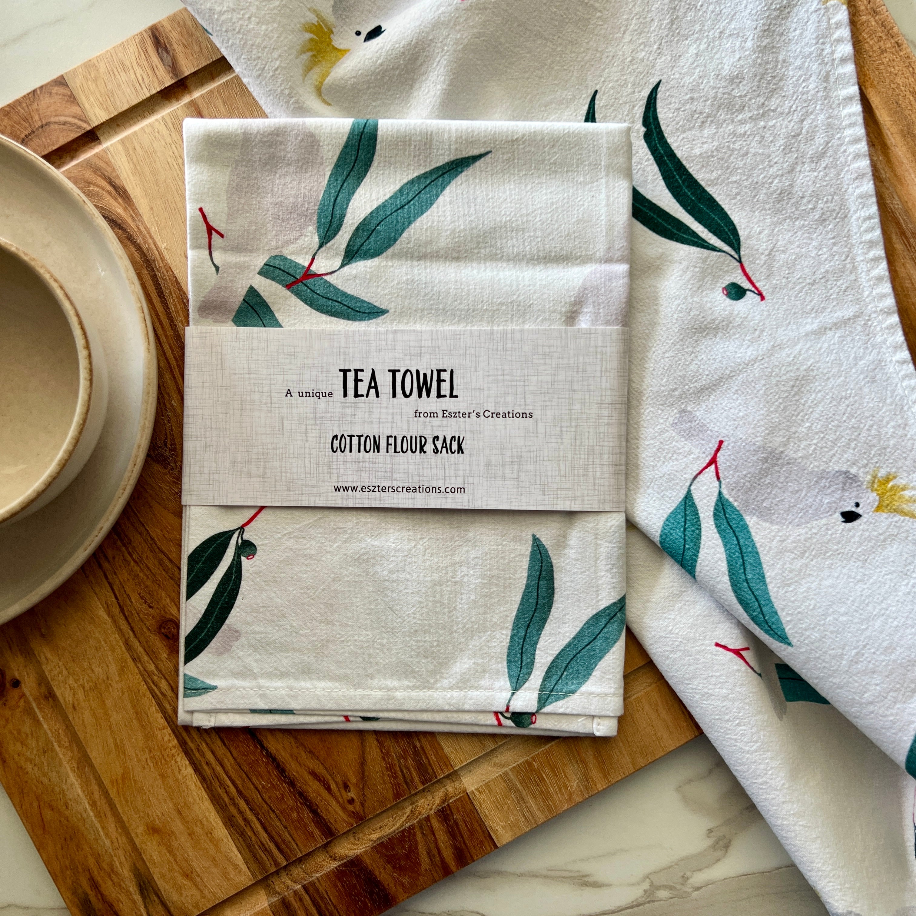  cotton teat towel featuring white cockatoo with eucalyptus leaves by eszter's creations